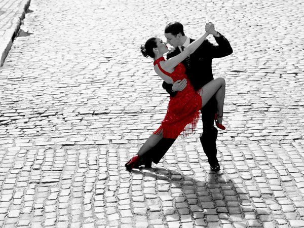 Anonymous, Couple dancing Tango on cobblestone road